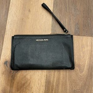 Black leather Michael Kors wristlet